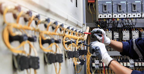 Professional Electrician technician working in Miami Lakes, FL